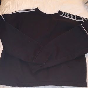 White strip on sleeves, with black sweater top